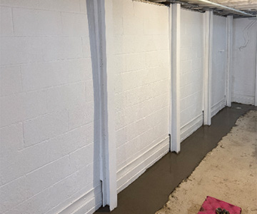 Beams & basement wall support installation in WNY, prevents severe foundation failure